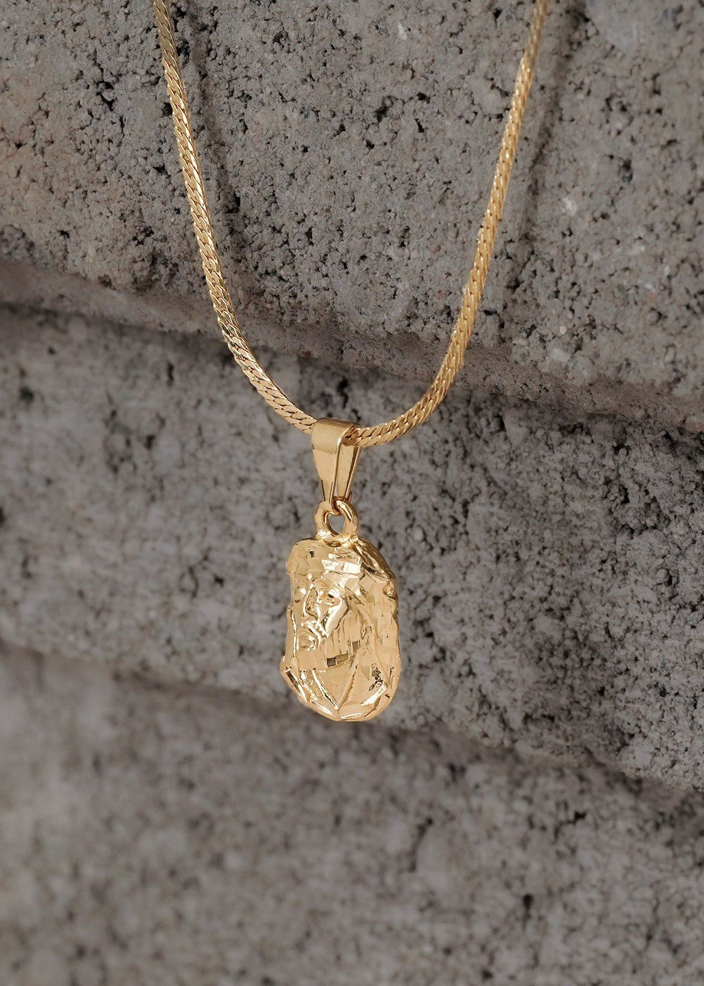 Cadena serpiente plana delg 1mm 65cm + Dije Rostro Mediano Tallado