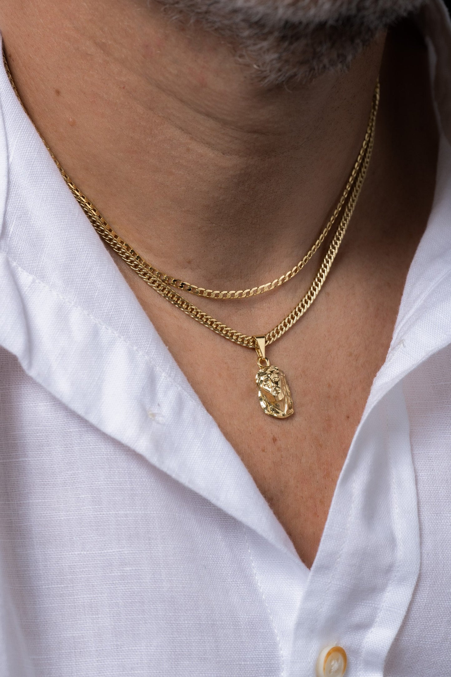 Cadena continua 3mm 45cm + dije rostros mediano tallado