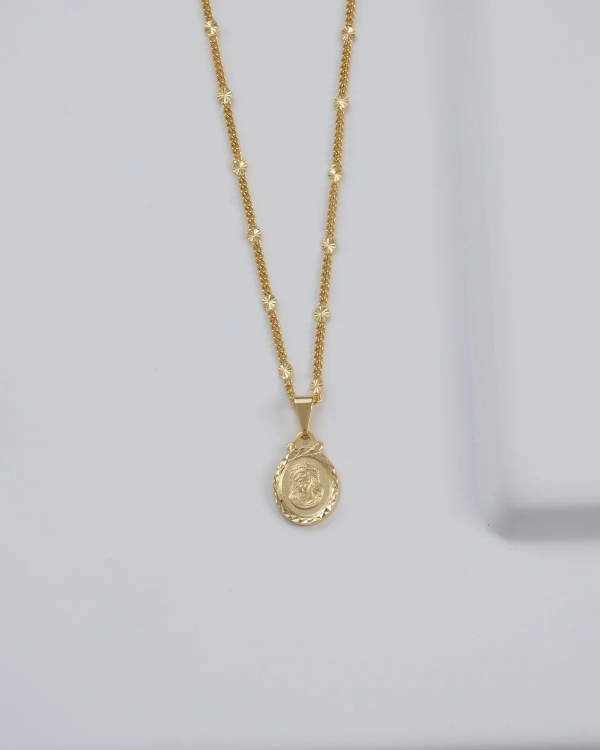 CADENA CUBANA SOL 65 CMS + DIJE SAGRADO ROSTRO DIAMANTADO 2 CMS