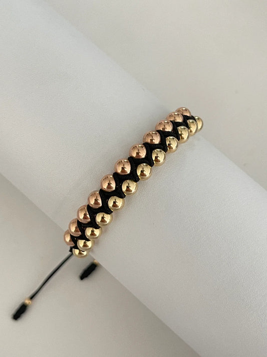 Pulsera Entrelazada dos oros