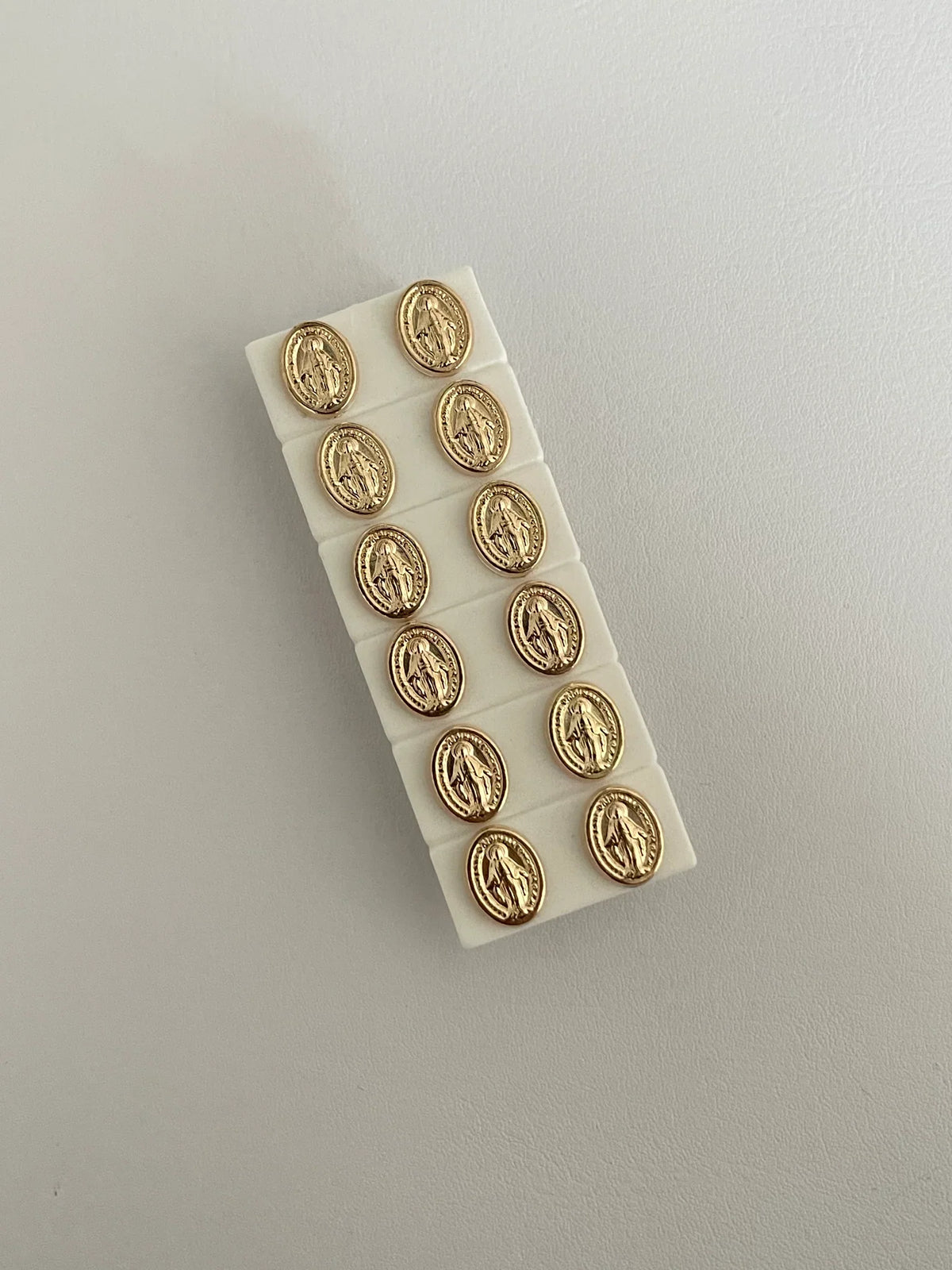 Topos Virgen Broche Seguridad