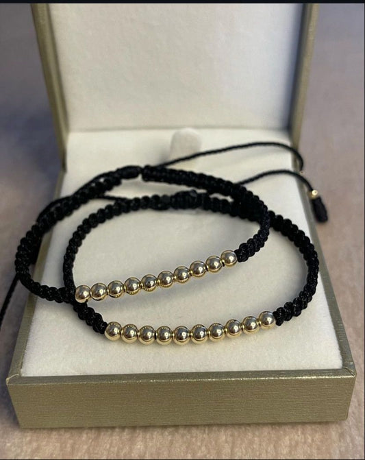 Juego pulseras balin #4 negra. X2