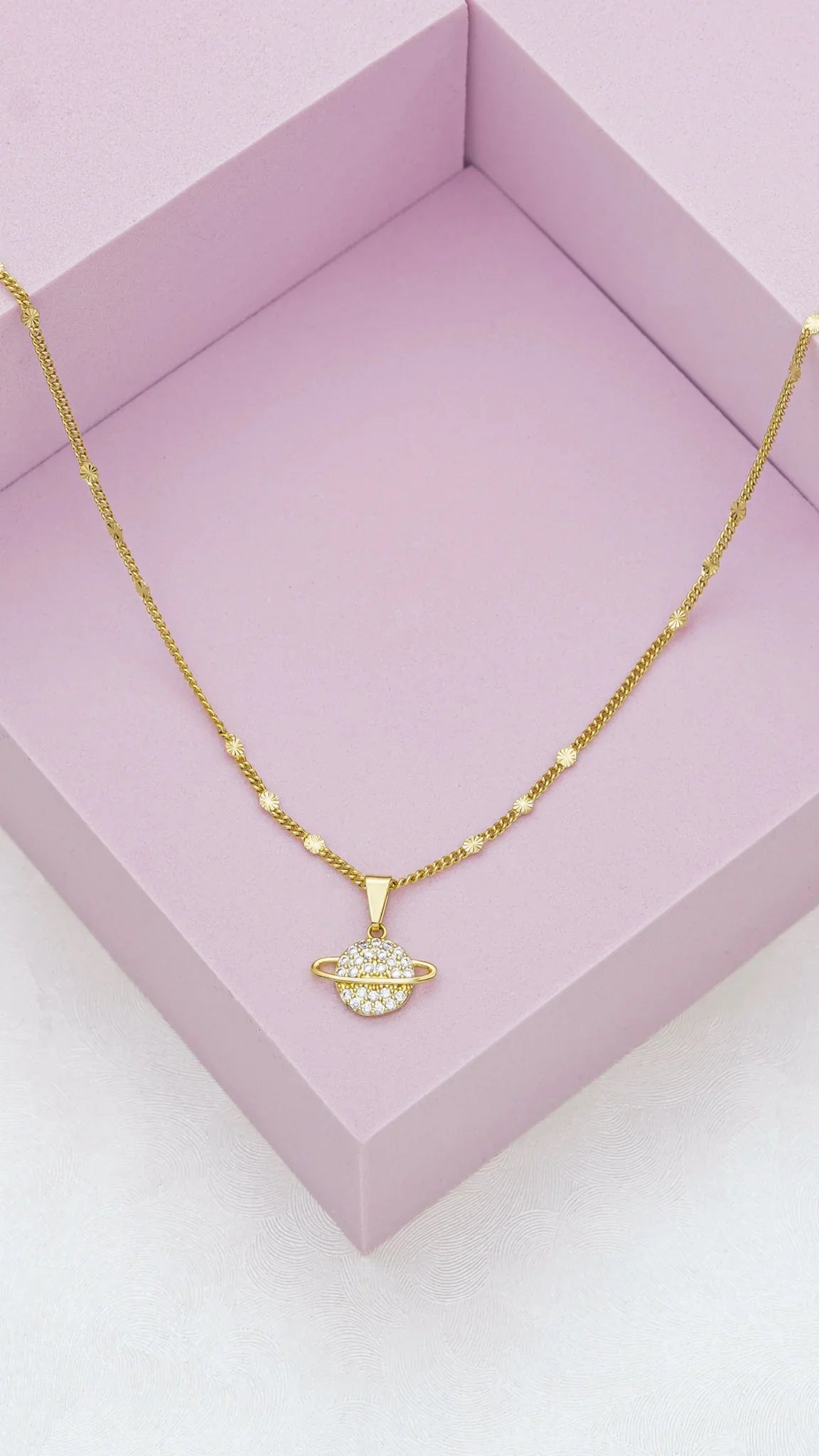 Cadena con Destellos 45cms + Dije Saturn Circonia